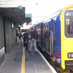 Passengers alight from a train at Temple Meads
