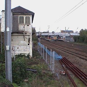 2005, November. Erection of fence between box and railway - fortunately there were points to sidings in front of the box leaving a wide margin where a