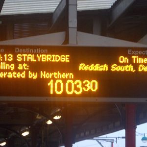 The screen on platform 1 showing that the train would be stopping at Reddish South.